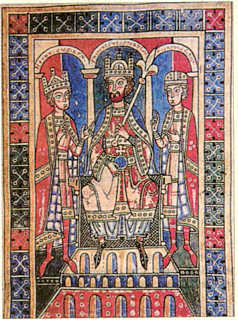 Diese historische Darstellung zeigt Kaiser Barbarossa auf dem Thron mit den Insignien seiner Macht.